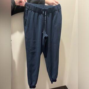 Like new womens lulu lemon navy joggers, no damage